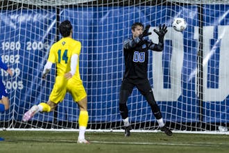 Eliot Hamill notched two saves in the net against the Wolverines.