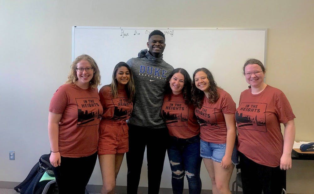 Zion Williamson poses with "In the Heights" executive producer Shaina Lubliner and other members of the cast. 