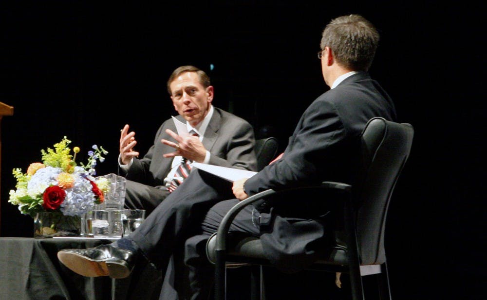 David Petraeus, left, analyzed an array of pressing national security topics with political science professor Peter Feaver, right.