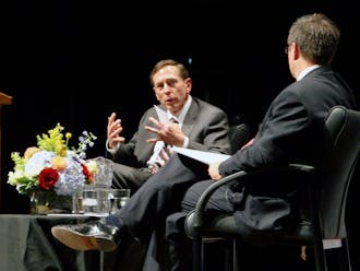 David Petraeus, left, analyzed an array of pressing national security topics with political science professor Peter Feaver, right.