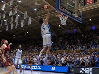 Tyrese Proctor slams the ball down during the first half of Duke's game against Boston College.