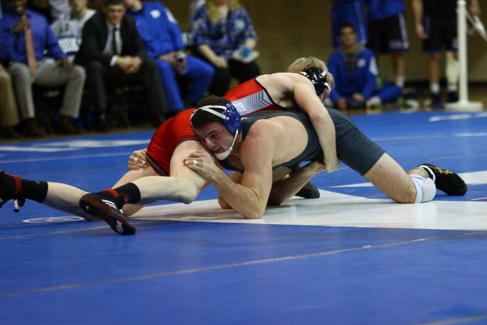<p>Jake Faust and three other Blue Devils will head to Madison Square Garden seeking All-America honors at the NCAA tournament, with Conner Hartmann vying for a national title at 197 pounds.</p>