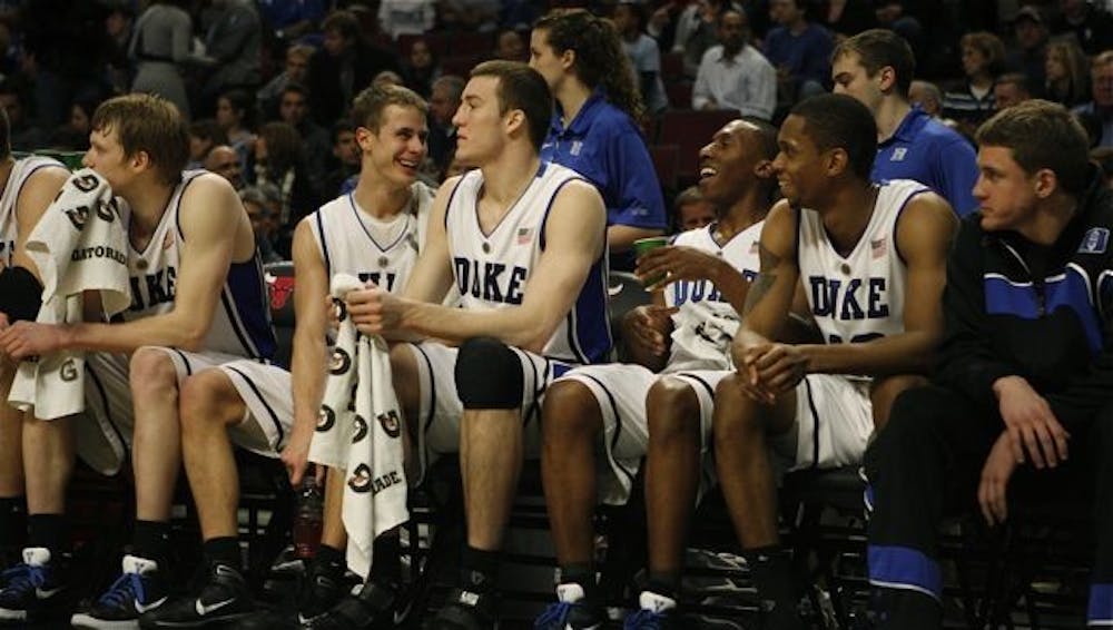 Senior Jon Scheyer, a Chicago native, scored 31 points to lead Duke past Iowa State at the United Center Wednesday.