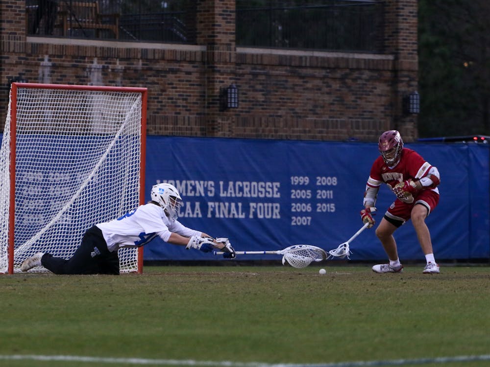 Graduate student William Helm in net for the Blue Devils in a Feb. 17 win against Denver.