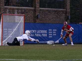 Graduate student William Helm in net for the Blue Devils in a Feb. 17 win against Denver.