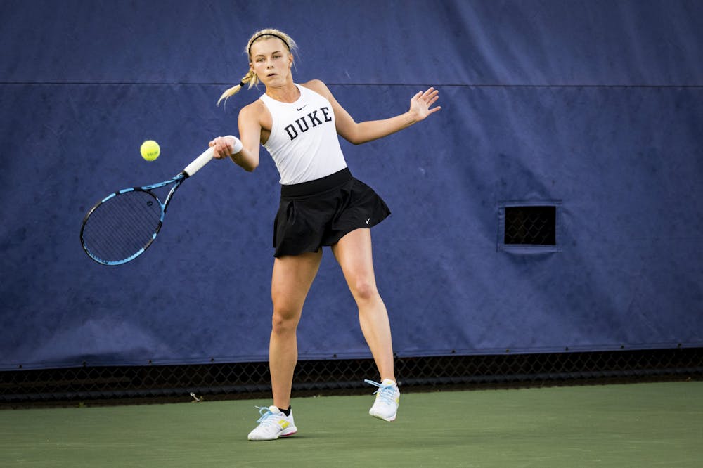 Sophomore Emma Jackson rallies during Duke's Friday evening match with William & Mary.