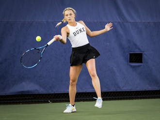 Sophomore Emma Jackson rallies during Duke's Friday evening match with William & Mary.