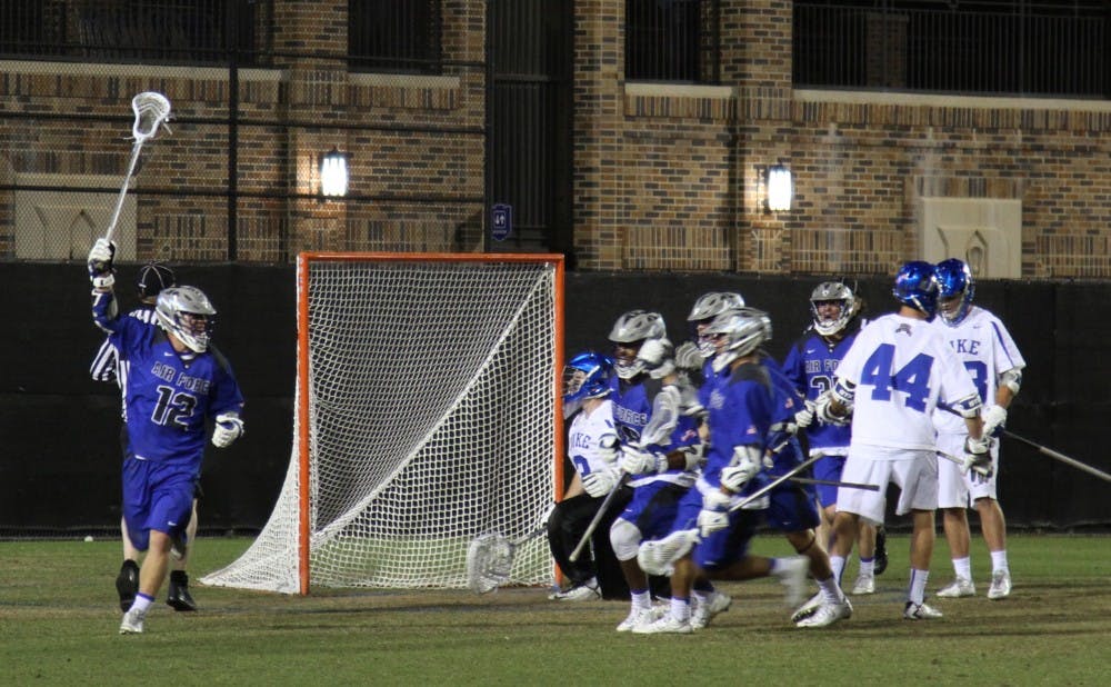 Air Force scored six unanswered goals in the second half to take a 9-8 lead, then scored the game-winner in the final seconds of overtime to beat the Blue Devils Tuesday in Durham.