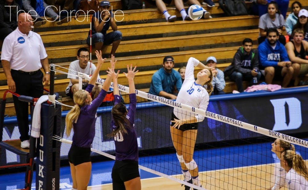 <p>Junior middle blocker Anna Kropf peaked at the right time late in Wednesday’s match to spark the Blue Devils’ five-set win.</p>