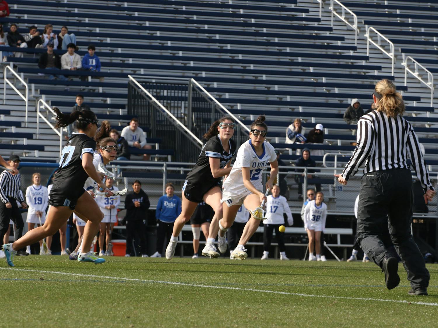 Olivia Carner chases after the ball during Duke's loss to Johns Hopkins.