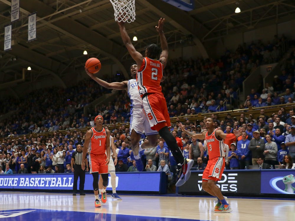 Jeremy Roach hooks the ball around a Syracuse defender in Duke's win.
