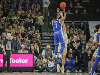 Caleb Foster pulls up for a 3-point jumper against Wake Forest.