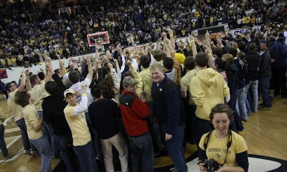 Georgia Tech students rushed the court at the Alexander Memorial Coliseum Saturday after the Yellow Jacket's four-point win over Duke.
