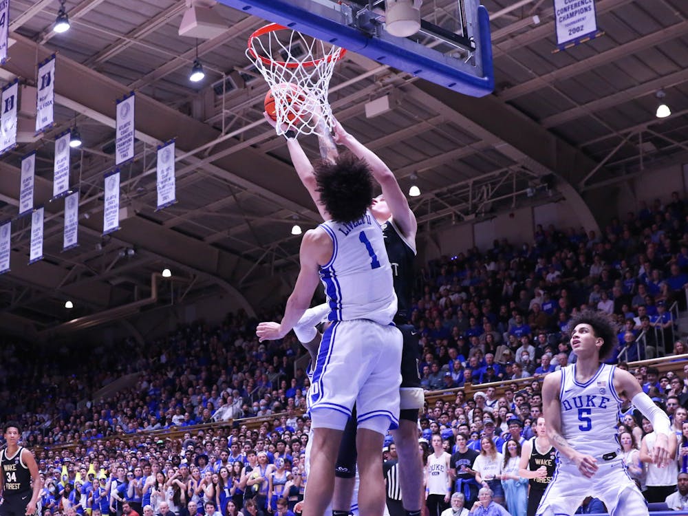 Dereck Lively II blocks a layup in Duke men's basketball most recent win against Wake Forest. 