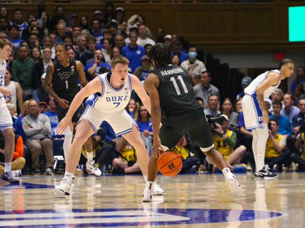 Freshman Kon Knueppel defends against a Virginia Tech attack. 