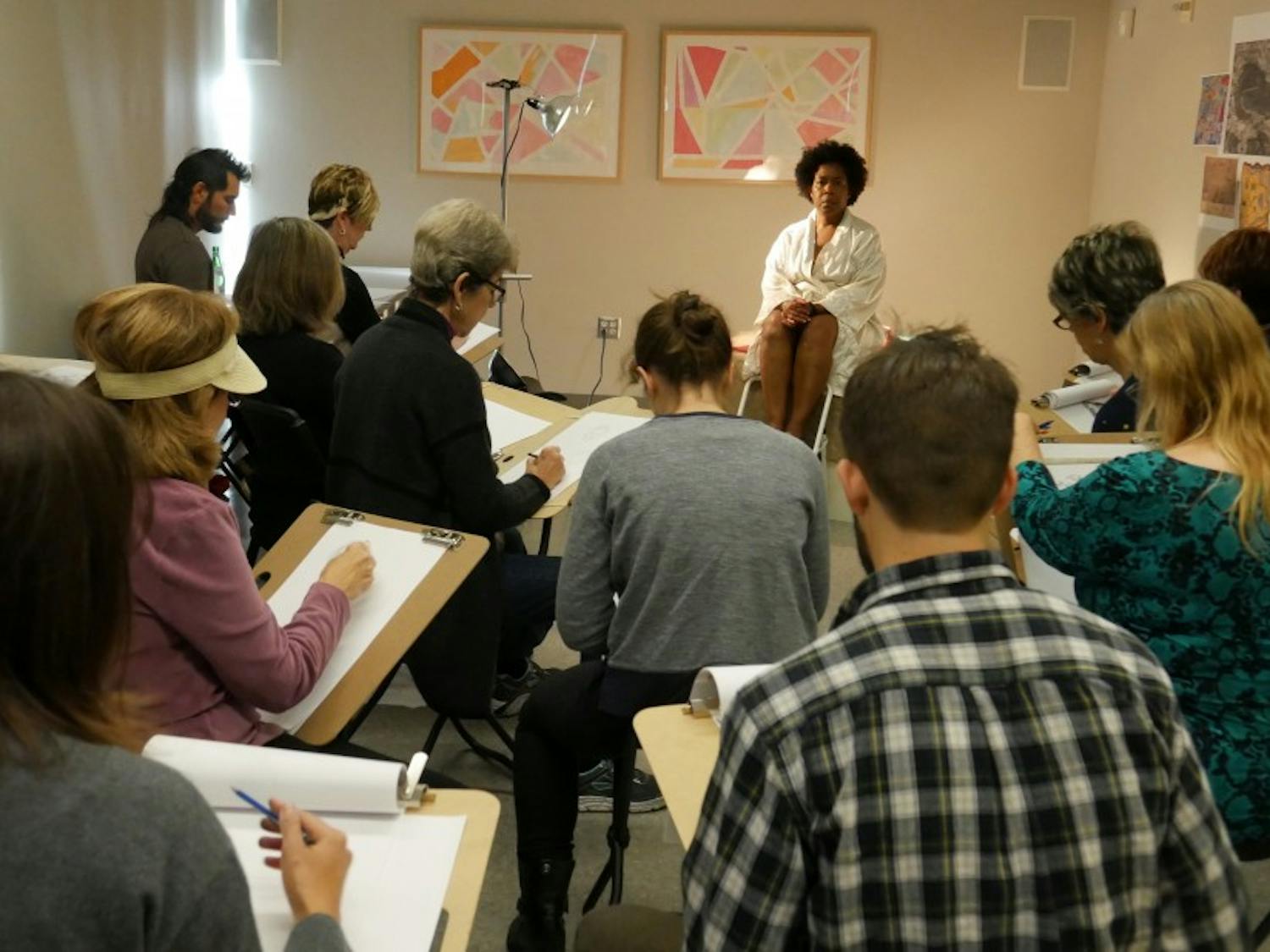 Artists gather in a classroom for the last of three sessions in this month's Nasher Creates Sketching Series, which centered around the Carlo Dolci exhibit.