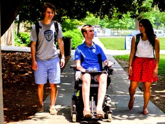 Junior Jay Ruckelshaus, center, is bringing a national disability conference to Duke to discuss accessibility and support options.