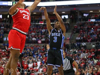 Duke guard Jeremy Roach shoots over Ohio State's Zed Key in a 2021 ACC/Big Ten Challenge matchup.