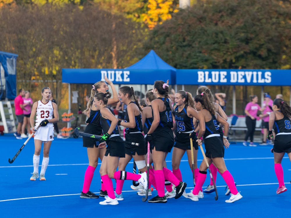 Duke field hockey huddles up during its game against Boston College.