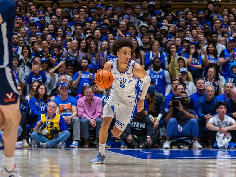 Tyrese Proctor races down the floor during Duke's win against Virginia.