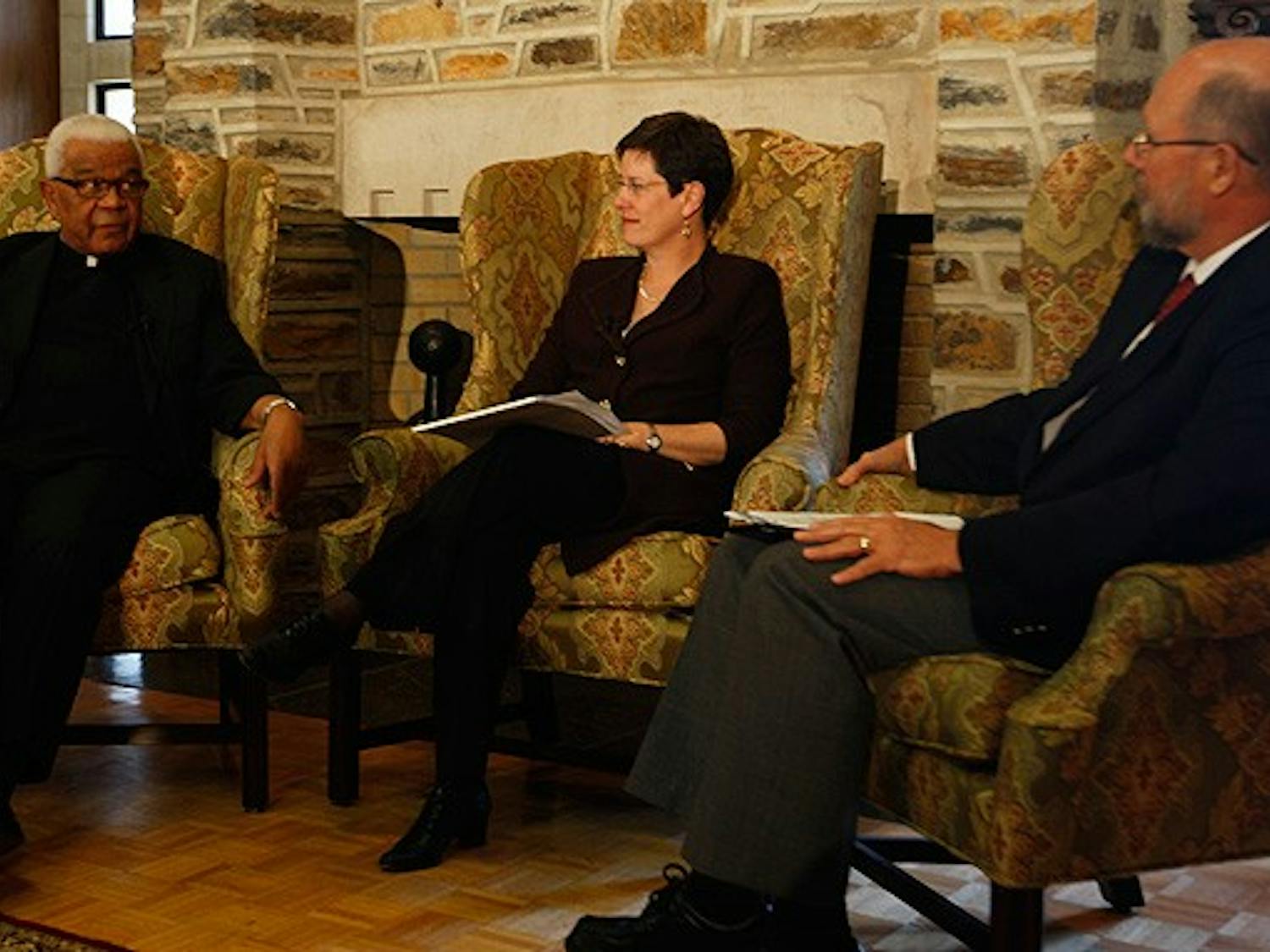 uthor John Allen (right) and professor Karin Shaprio (middle) interview Archbishop Walter Paul Khotso Makhulu in the Divinity School Friday afternoon.