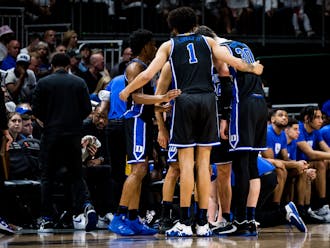 Duke players huddle during a Feb. 6 loss at Miami.
