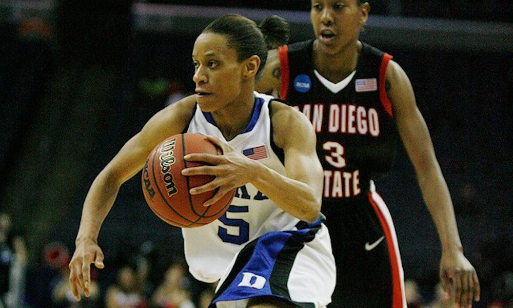 Guard Jasmine Thomas, seen here driving to the hoop against San Diego State, will be leading her team against the Baylor Lady Bears tonight hoping to come out with a Final Four bid.