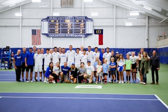 The Duke men's tennis community after defeating Alabama in the second round of the NCAA tournament. 