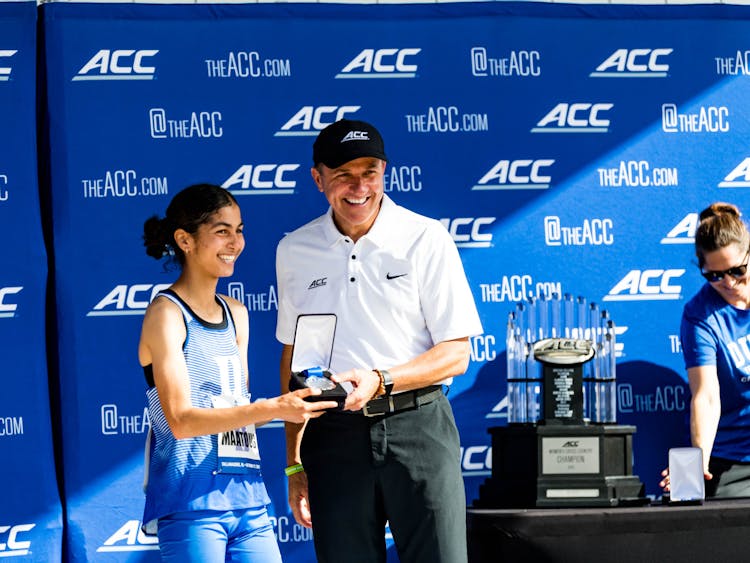 Amina Maatoug celebrates her second-place finish at the 2023 ACC Championships.