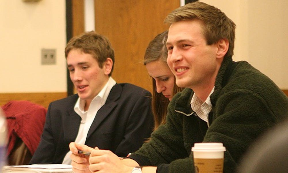 DUU President Zachary Perret approves the budget for this year’s LDOC celebration, which includes a $5000 loan, at Tuesday’s DUU meeting.