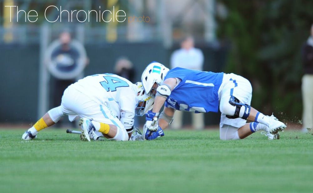 <p>Senior Kyle Rowe’s dominance at the faceoff X turned the tide of Sunday’s rivalry game&mdash;at one point, he won 17 of 18 faceoffs to keep the Blue Devils in attack mode.</p>