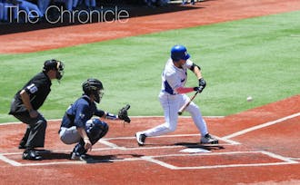 Leadoff man Jimmy Herron reached base four times, scoring a run and driving in another in Duke's ACC tournament opener.
