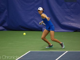 Meible Chi clinched Sunday's match against Washington with a dramatic three-set singles victory.