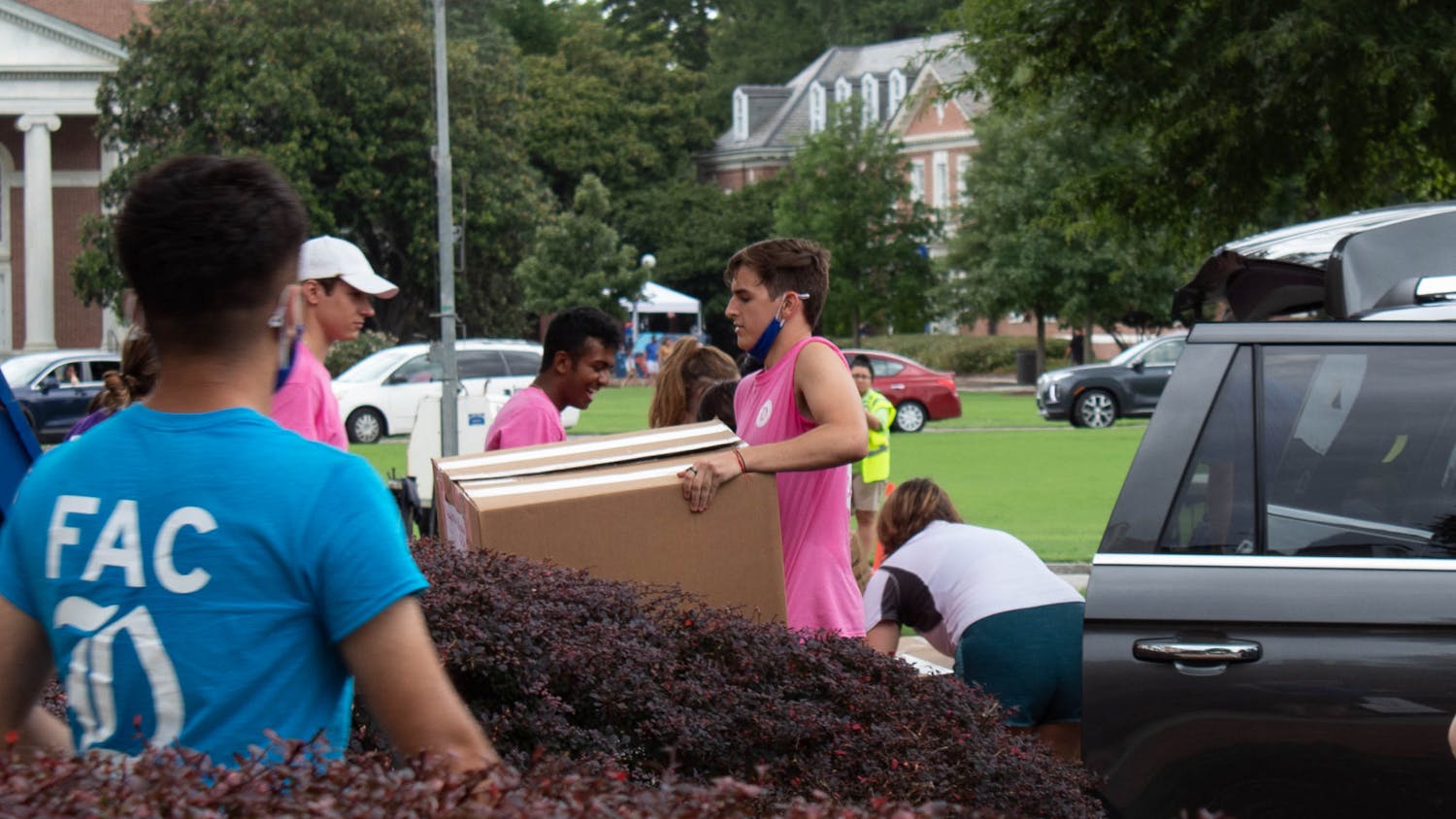 First-year advisory counselors move students' belongings into Giles dorm on Tuesday, move-in day for the Class of 2025.
