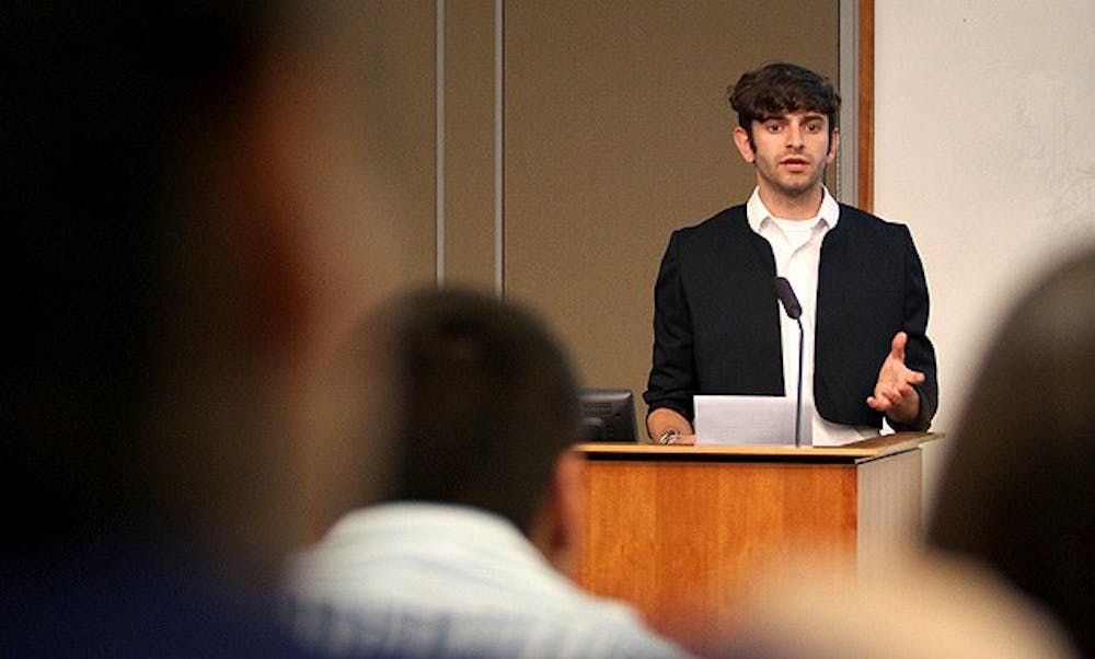 Jacob Tobia, a sophomore, speaks at the Duke Student Government meeting Wednesday evening.