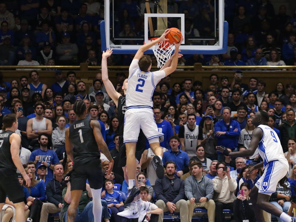 Cooper Flagg furiously dunks the ball against Virginia Tech. 