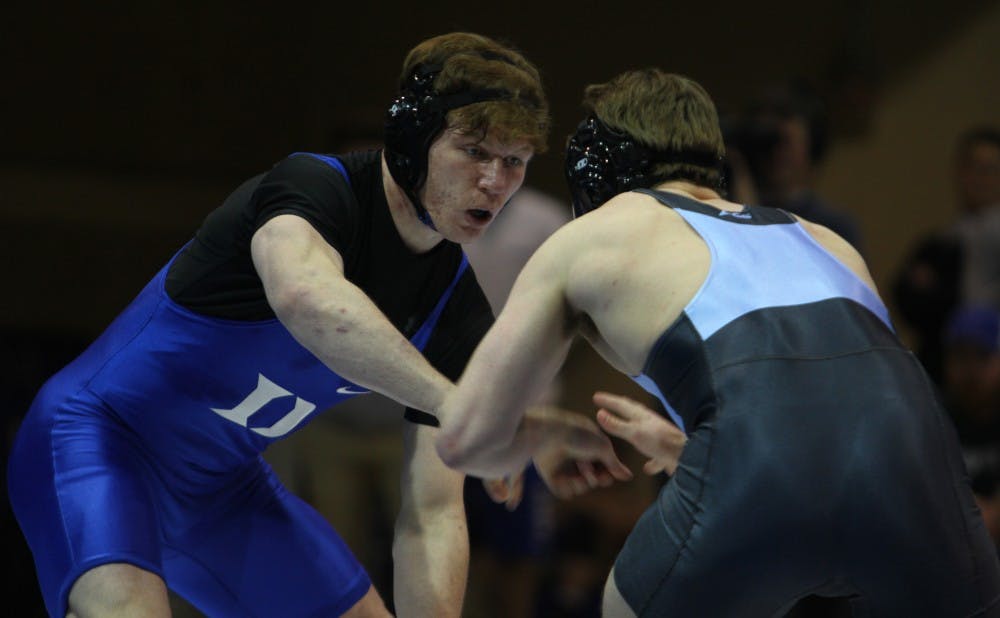 <p>Redshirt senior Conner Hartmann set the tone for the Blue Devils with a dominant performance at the Hokie Open.</p>
