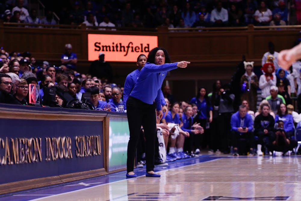 Head coach Kara Lawson shouts instructions from the sideline in Duke's loss to North Carolina.