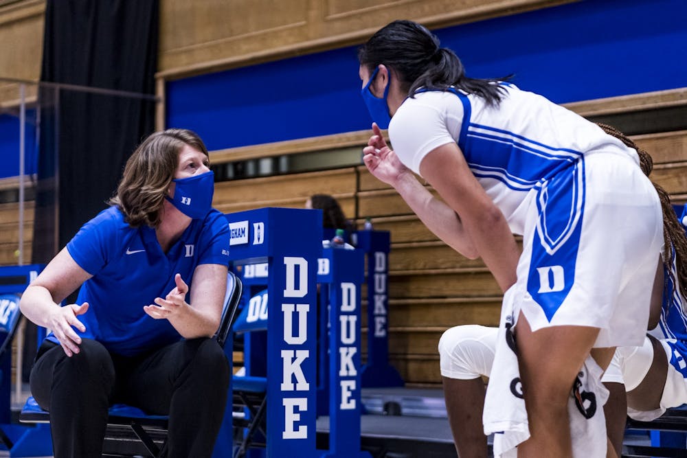 Beth Cunningham (left) brings nearly 20 years of college coaching experience to Durham.