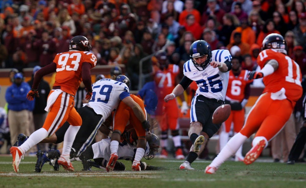 Linebacker Kelby Brown (left) and kicker Ross Martin (right) each earned ACC Player of the Week honors after Duke’s upset victory against Virginia Tech.