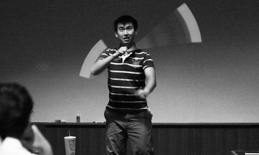 SOFC Chair David Hu, a junior, breaks out a dance to make a point during the DSG meeting Wednesday night.