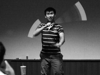SOFC Chair David Hu, a junior, breaks out a dance to make a point during the DSG meeting Wednesday night.
