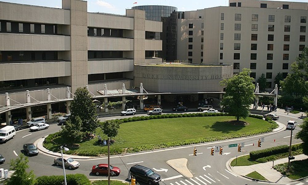The main entrance to Duke University Hospital was barricaded after a man was shot dead by a Duke Police officer at 1 a.m. Saturday morning. DUPD identified the officers involved as Larry Carter and Jeffrey Liberto, but has yet to announce the identity of the individual who died.