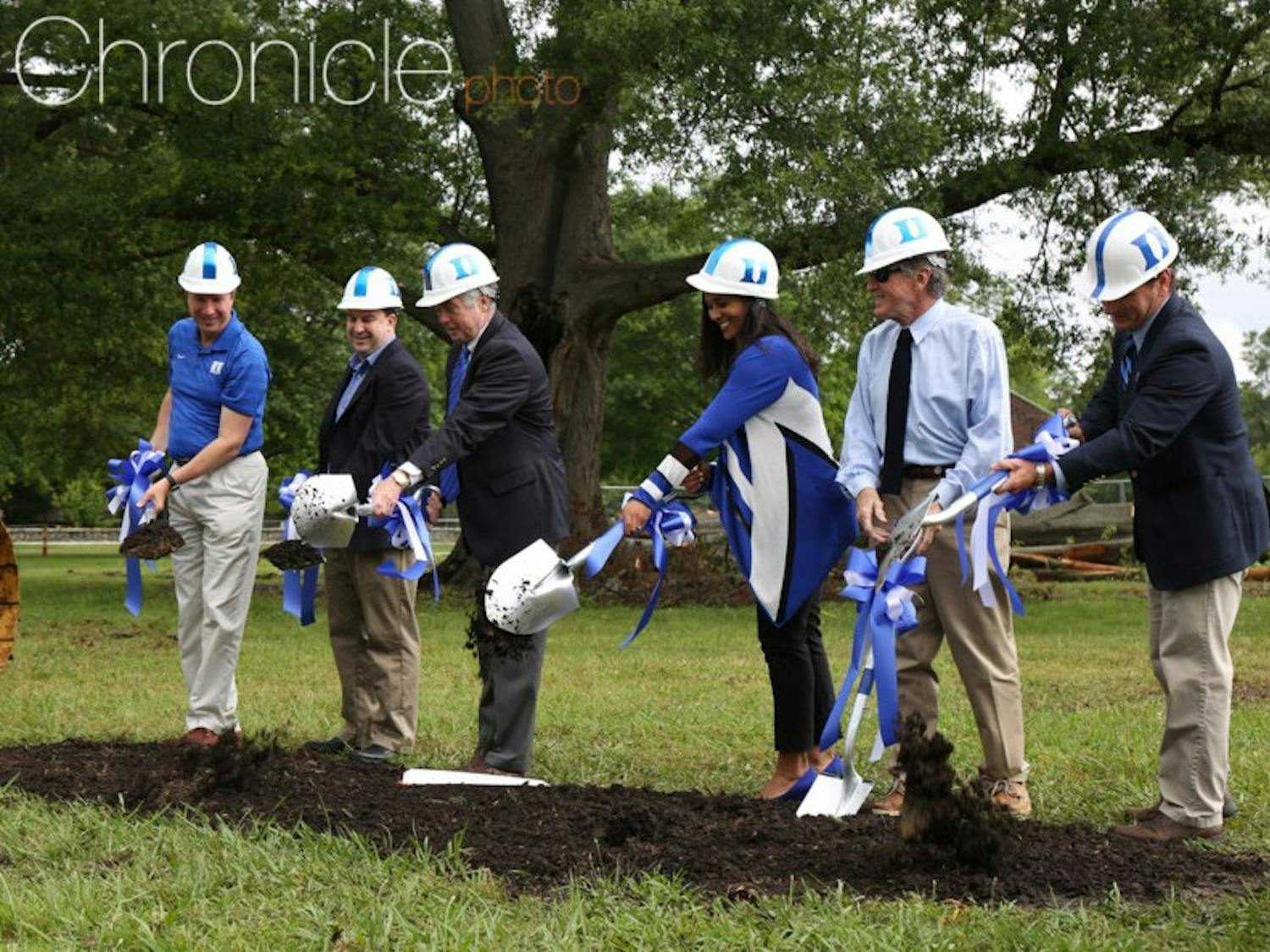 Marissa Young (third from right), Kevin White (third from left) and members of the Duke Athletics staff break ground on Duke Softball Stadium in May 2016.