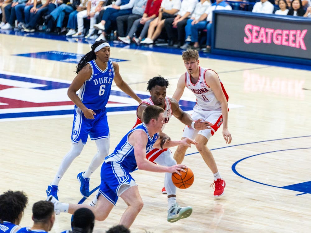 Kon Knueppel drives to the basket against Arizona. 