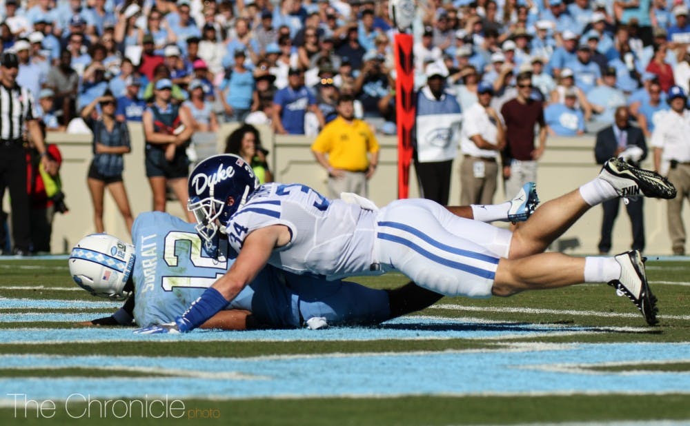 <p>Chazz Surratt was responsible for a few big plays, but was under heavy pressure from the Blue Devil defense for most of the game.</p>
