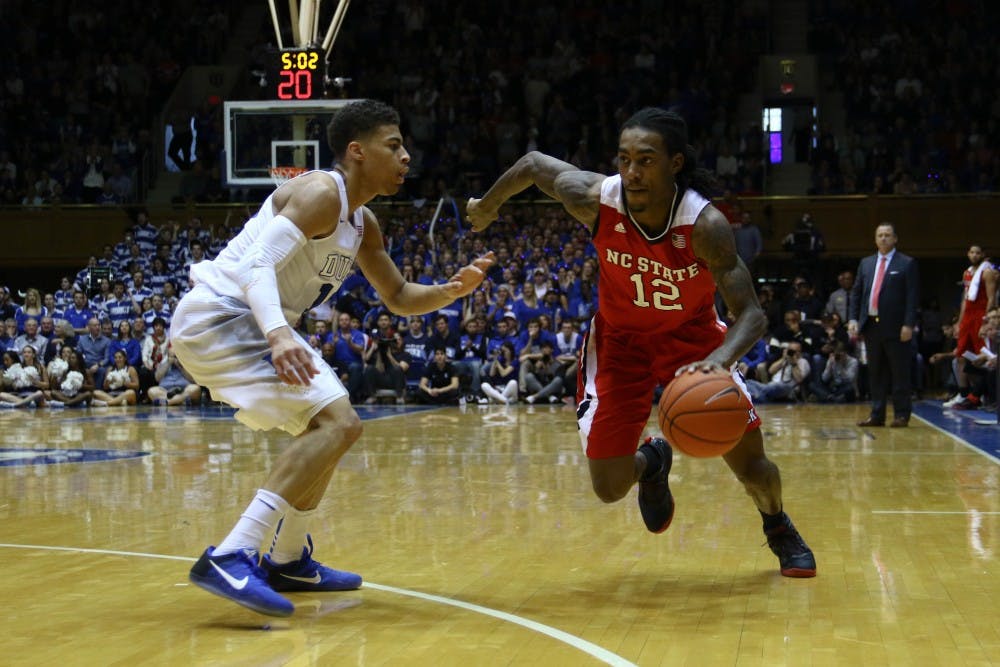 After a slow start, Anthony "Cat" Barber scored 26 points to help the Wolfpack mount a second-half rally.