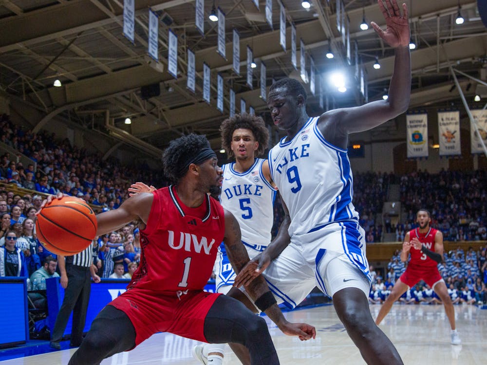 Khaman Malauch and Tyrese Proctor trap Incarnate Word's Jalin Anderson. 