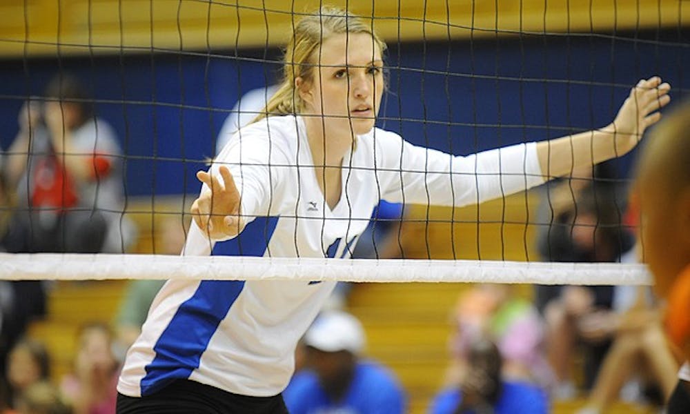 Freshman middle blocker Christiana Gray (left) and junior libero Claire Smalzer (right) have helped make Duke’s blocking unit one of the most effective in the ACC.