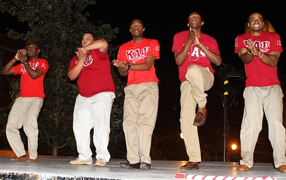 Kappa Alpha Psi fraternity performs a step routine earlier this semester. National Pan-Hellenic Council chapters often use step shows to inform the student body about the rush process.